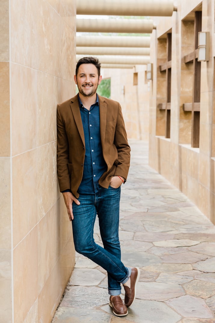 Man in Suede Business Jacket and Denim Pants